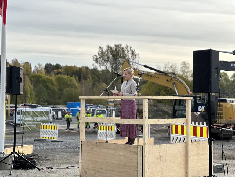 A person standing on a construction site